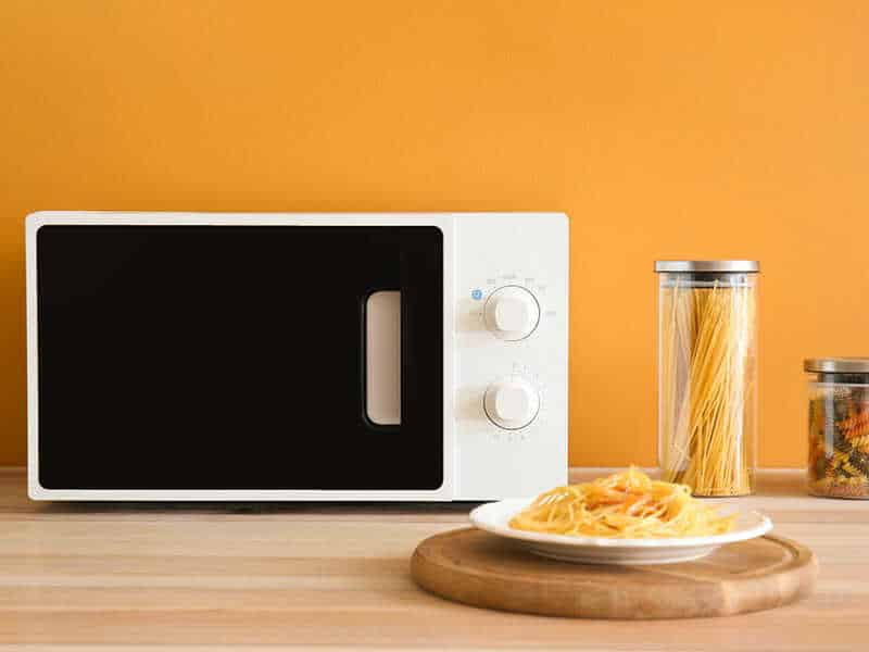 Modern compact microwave oven in kitchen